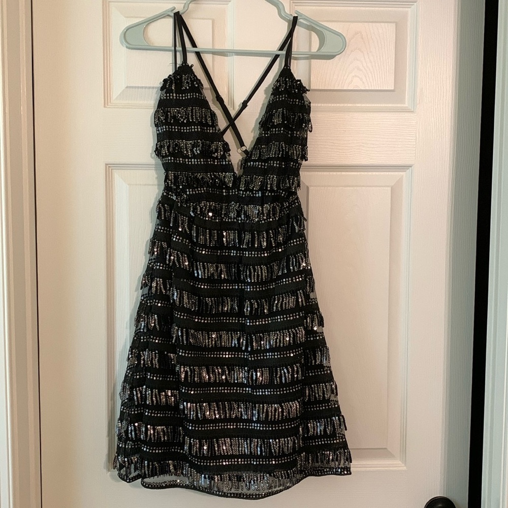 Black, fringe and sequin dress by Southern Fried Chics